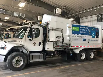 Waste and Recycling Truck in garage