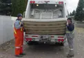 waste big item pick up workers loading mattress