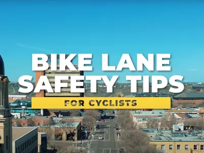 Bike Lane Safety Tips for Cyclists clock tower in background