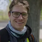 smiling parks employee headshot outside