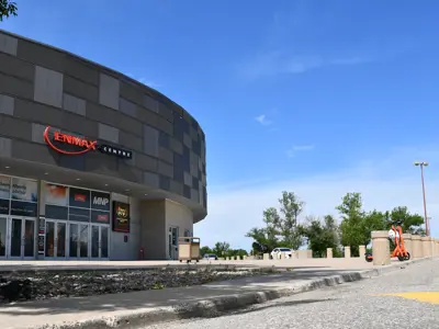 Enmax Building Orange Neuron Scooters 